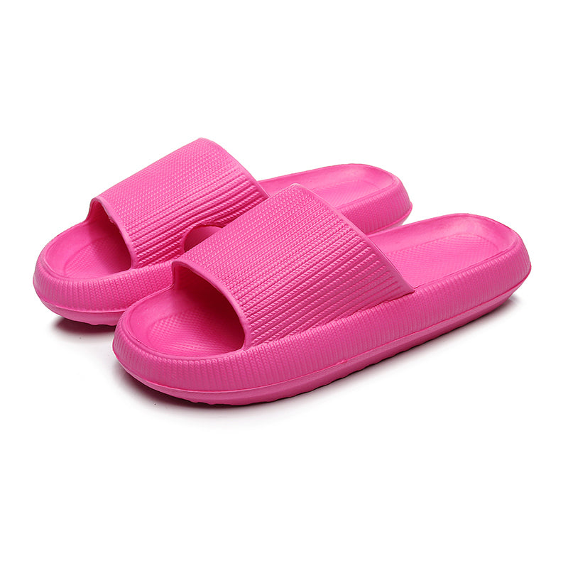 Hot pink CloudSlides™ with a bold, eye-catching color and plush, supportive sole perfect for lounging or going out.
