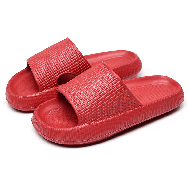 Red CloudSlides™ with a supportive sole and wide strap, offering bold color and cozy footbed for daily use.